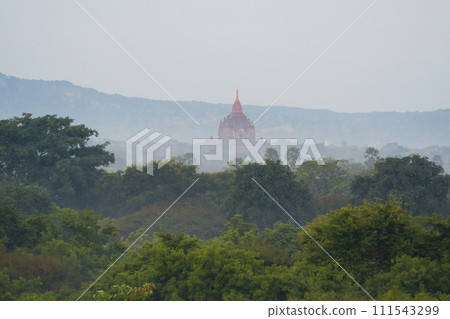 Aerial top view of burmese temples of Bagan City from a balloon, unesco world heritage with forest trees, Myanmar or Burma. Tourist destination. Aerial top view of burmese temples of Bagan City from a balloon, unesco world heritage with forest trees, Myanmar or Burma. Tourist destination. 111543299