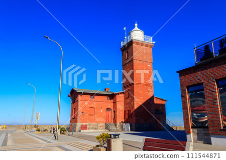Old brick lighthouse at the Wieprza river mouth to the Baltic Sea in Darlowko, Poland Old brick lighthouse at the Wieprza river mouth to the Baltic Sea in Darlowko, Poland 111544871