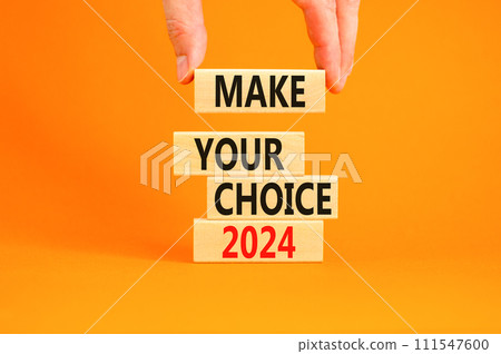 Make your choice 2024 symbol. Concept words Make your choice 2024 on beautiful wooden block. Beautiful orange table orange background. Voter hand. Business Make your choice 2024 concept. Copy space. 111547600