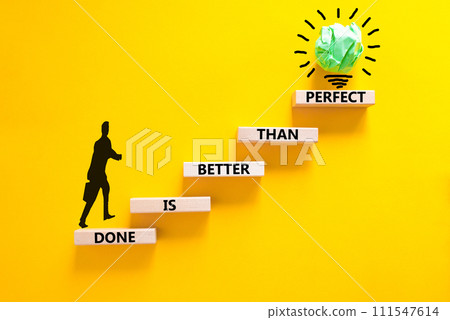 Done is better than perfect symbol. Concept words Done is better than perfect on wooden blocks. Beautiful yellow background. Businessman icon. Business done is better than perfect concept. Copy space. 111547614