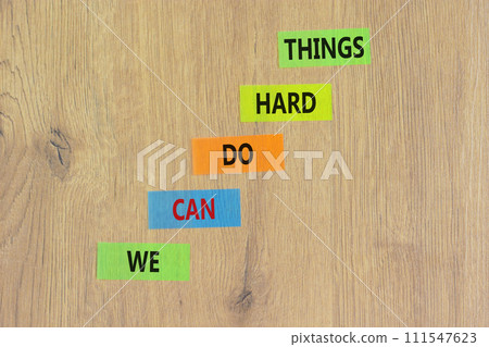 We can do hard things symbol. Concept words We can do hard things on colored paper. Beautiful wooden background. Business, we can do hard things concept. Copy space. We can do hard things symbol. Concept words We can do hard things on colored paper. Beautiful wooden background. Business, we can do hard things concept. Copy space. 111547623