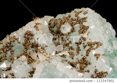 Macro stone mineral Fluorite on a black background Macro stone mineral Fluorite on a black background 111547902
