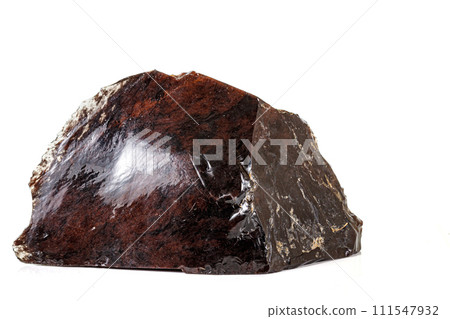 Macro Obsidian mineral stone on white background Macro Obsidian mineral stone on white background 111547932