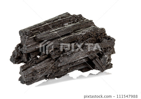 Macro stone black mineral tourmaline Scherl on white background Macro stone black mineral tourmaline Scherl on white background 111547988