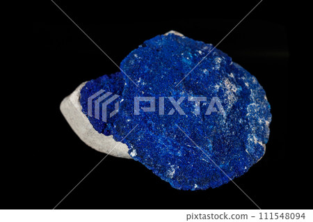 Macro mineral stone Azurite in siltstone against black background 111548094