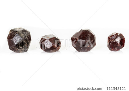 macro mineral stone  Garnet, on a white background 111548121