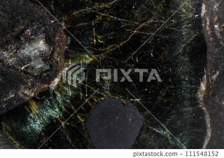 Macro Diopside mineral stone on black background 111548152