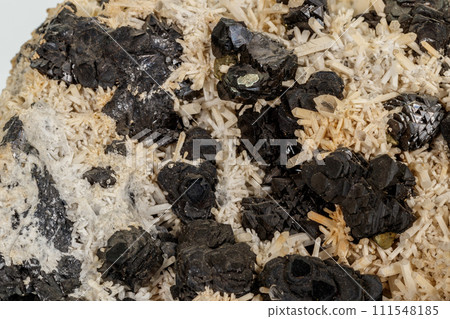 Macro stone mineral Pyrrhotite, quartz, Sphalerite, calcite, Galena on white background Macro stone mineral Pyrrhotite, quartz, Sphalerite, calcite, Galena on white background 111548185
