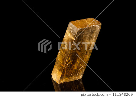 Macro stone Calcite mineral on a black background Macro stone Calcite mineral on a black background 111548209