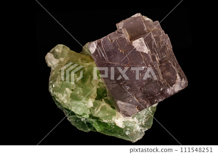 macro mineral fluorite stone on black background 111548251