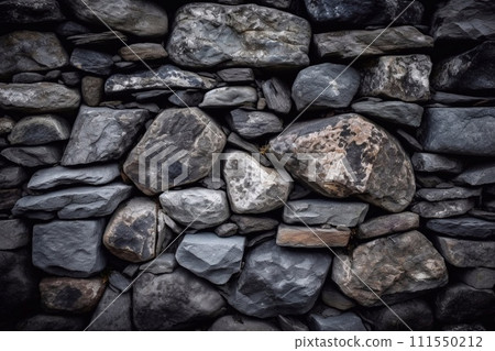 Stacked stone wall. Wall texture, with stacked natural stones in irregular pattern. Stacked stone wall. Wall texture, with stacked natural stones in irregular pattern. 111550212