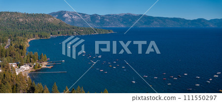 Beautiful aerial view of the Tahoe lake from above in California, USA. Wild forests, fresh air and mountains of California. Beautiful aerial view of the Tahoe lake from above in California, USA. Wild forests, fresh air and mountains of California. 111550297
