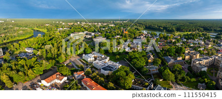 Aerial panoramic view of Lithuanian resort Druskininkai. Druskininkai in autumn colours, drone picture of multi coloured trees in most beautiful city of Druskininkai in Lithuania 111550415