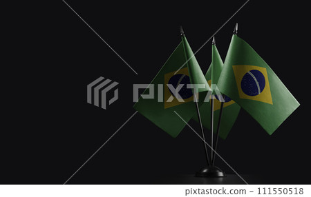 Small national flags of the Brazil on a black background 111550518