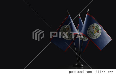 Small national flags of the Belize on a black background Small national flags of the Belize on a black background 111550566
