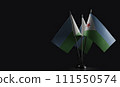 Small national flags of the Djibouti on a black background 111550574