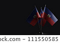 Small national flags of the Australia on a black background 111550585