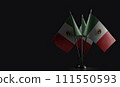Small national flags of the Mexico on a black background 111550593