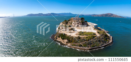 Aerial view of the prison island of Alcatraz in San Francisco Bay, Alcatraz jail in San Francisco bay aerial view. Beautiful aerial view of the Alcatraz island with Golden Gate bridge. Aerial view of the prison island of Alcatraz in San Francisco Bay, Alcatraz jail in San Francisco bay aerial view. Beautiful aerial view of the Alcatraz island with Golden Gate bridge. 111550685