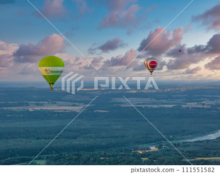 Aerial summer sunny sunset view of hot air balloon over Galve lake, Lithuania 111551582