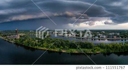 Thunderstorm over Riga. Huge thunderstorm dark clouds over the city of Riga 111551767