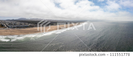Where the sea meets the land in San Francisco. Ocean Beach is a world renowned surfing beach in the Sunset district of San Francisco. Cliff house building on the cliffs. Where the sea meets the land in San Francisco. Ocean Beach is a world renowned surfing beach in the Sunset district of San Francisco. Cliff house building on the cliffs. 111551778