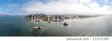 Where the sea meets the land in San Francisco. Ocean Beach is a world renowned surfing beach in the Sunset district of San Francisco. Cliff house building on the cliffs. Where the sea meets the land in San Francisco. Ocean Beach is a world renowned surfing beach in the Sunset district of San Francisco. Cliff house building on the cliffs. 111551897