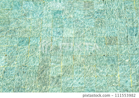 Sunshine through the ripples of water in swimming pool. Sunshine through the ripples of water in swimming pool. 111553982