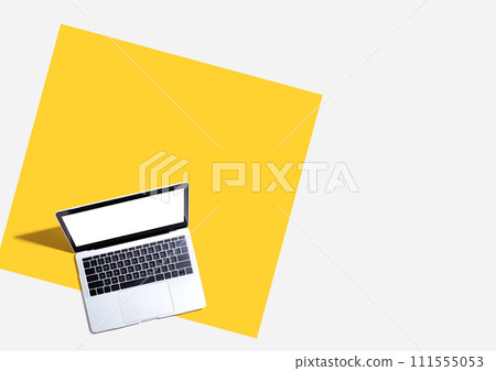 Laptop computer with shadow from above 111555053