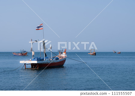 Fishing boats in the beautiful blue sea, Bang Saen, Thailand 111555507