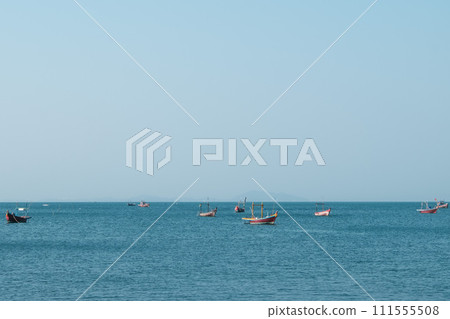 Fishing boats in the beautiful blue sea, Bang Saen, Thailand 111555508