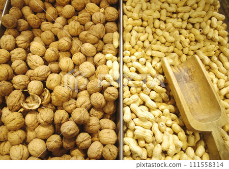 Walnuts and shelled peanuts sold by weight Walnuts Peanuts 111558314