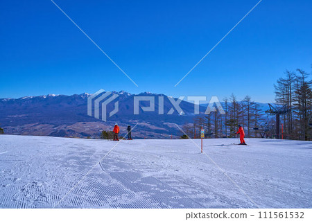 Yatsugatake mountain range on the northeast side seen from the gondola summit station of Fujimi Panorama Resort in Fujimi Town, Nagano Prefecture in winter Yatsugatake mountain range on the northeast side seen from the gondola summit station of Fujimi Panorama Resort in Fujimi Town, Nagano Prefecture in winter 111561532