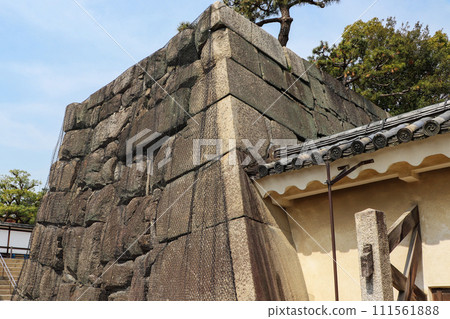 A large stone wall remaining at Nijo Castle in Kyoto A large stone wall remaining at Nijo Castle in Kyoto 111561888
