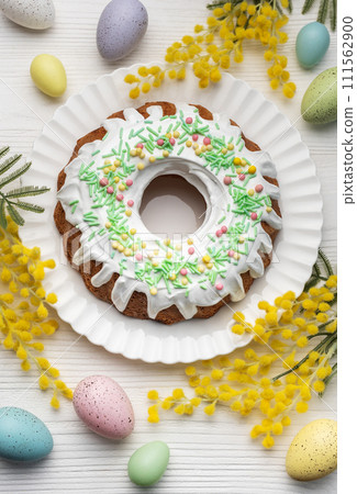 Easter Bundt Cake with Easter Eggs 111562900
