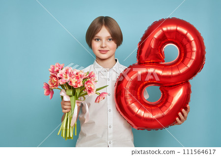 Happy child with Tulips bouquet and balloon number 8 111564617