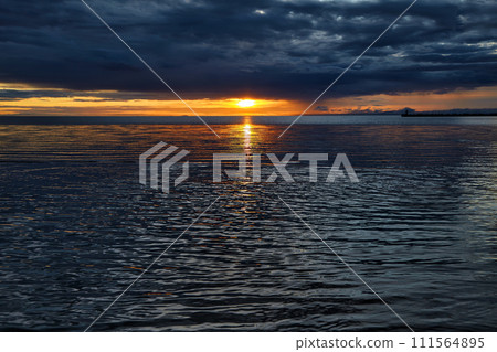 Majestic dramatic sunset on the sea in Tuchahu. Harbinger of bad weather Majestic dramatic sunset on the sea in Tuchahu. Harbinger of bad weather 111564895
