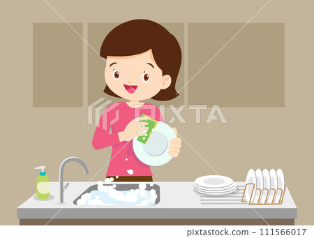 woman wearing in an apron is washing dishes woman wearing in an apron is washing dishes 111566017