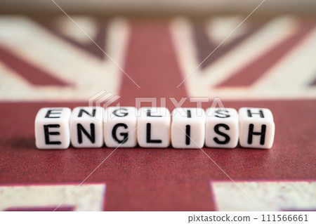 Word English on United Kingdom flag, learning English language courses concept. 111566661