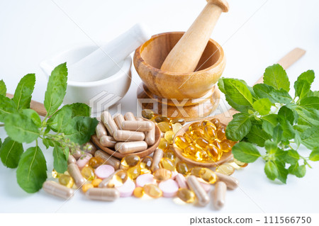 Alternative medicine herbal organic capsule with vitamin E omega 3 fish oil, mineral, drug with herbs leaf natural supplements for healthy good life. 111566750