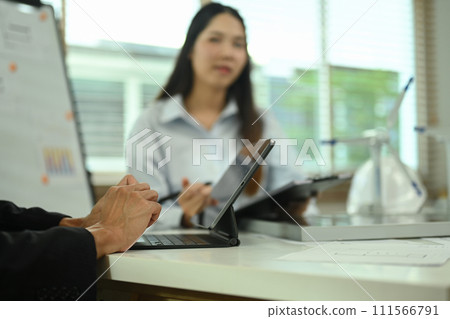 Team of engineers working on renewable energy project at office. Sustainability and green energy development concept 111566791