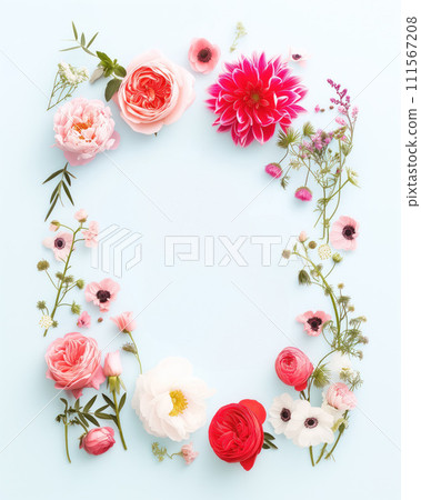 White flat lay with white, red and pink spring and summer flowers on it. View from the above 111567208