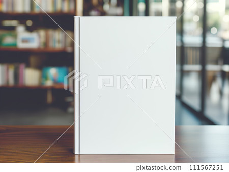 Advertising close up mockup shot of book stands on wooden coffee table and many books at the background Advertising close up mockup shot of book stands on wooden coffee table and many books at the background 111567251