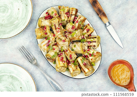 Georgian eggplant rolls, badrijani 111568559