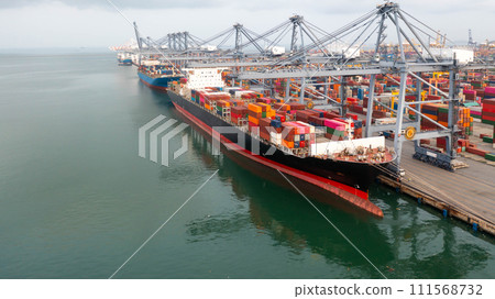 Aerial view container cargo ship maritime carrying container, Global business import export logistic freight shipping transportation international by container cargo ship, Container fright shipping. Aerial view container cargo ship maritime carrying container, Global business import export logistic freight shipping transportation international by container cargo ship, Container fright shipping. 111568732