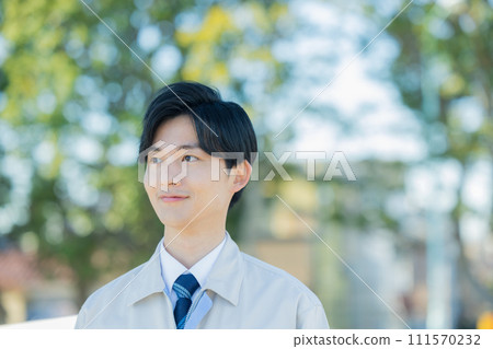 A man wearing work clothes 111570232