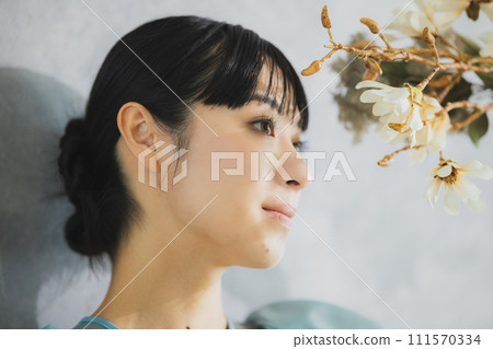 A woman with flowers 111570334