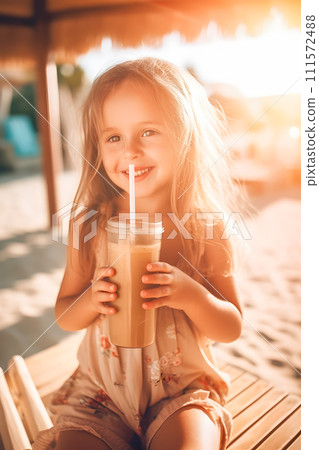 AI-generated content. vertical Toddler girl drinking organic smoothie at the beach ai generated art 111572488