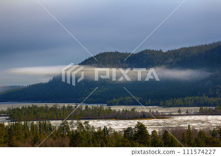 Misty spring morning forest and lake in may Misty spring morning forest and lake in may 111574227