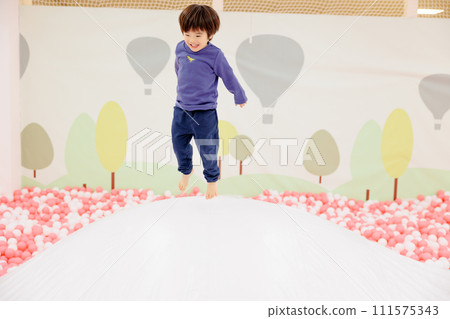 A boy playing around cheerfully 111575343